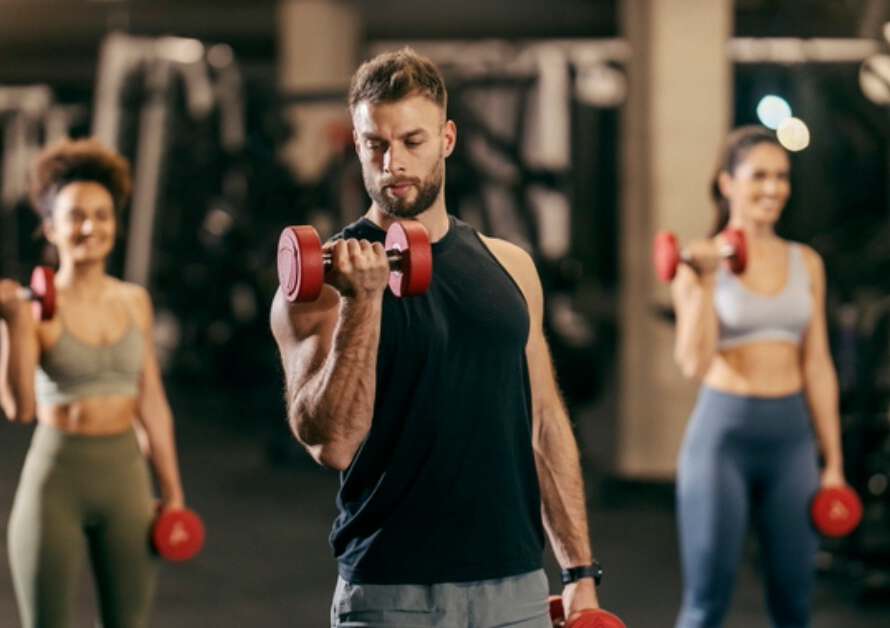 a person flexing in the gym